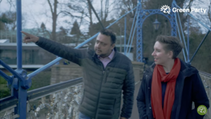 Screenshot from Greenparty political broadcast April 2023 - showing Naveen on bridge (small)